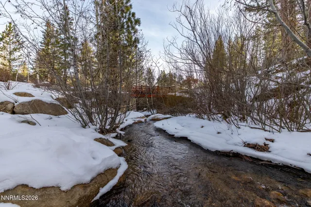 a view of a town with mountains