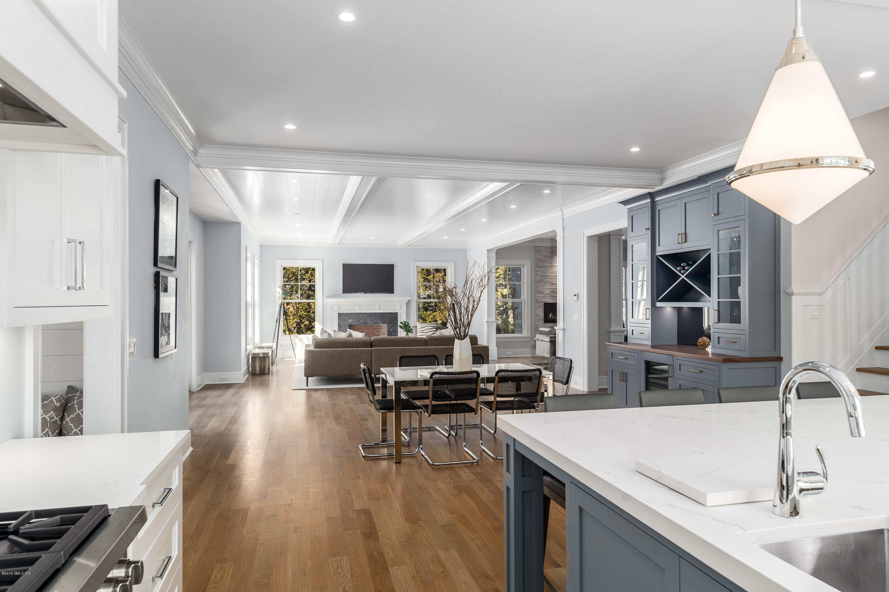 22 Mimosa Drive Cos Cob, CT 06807 - Photo 11 of 27 a kitchen with sink refrigerator and cabinets