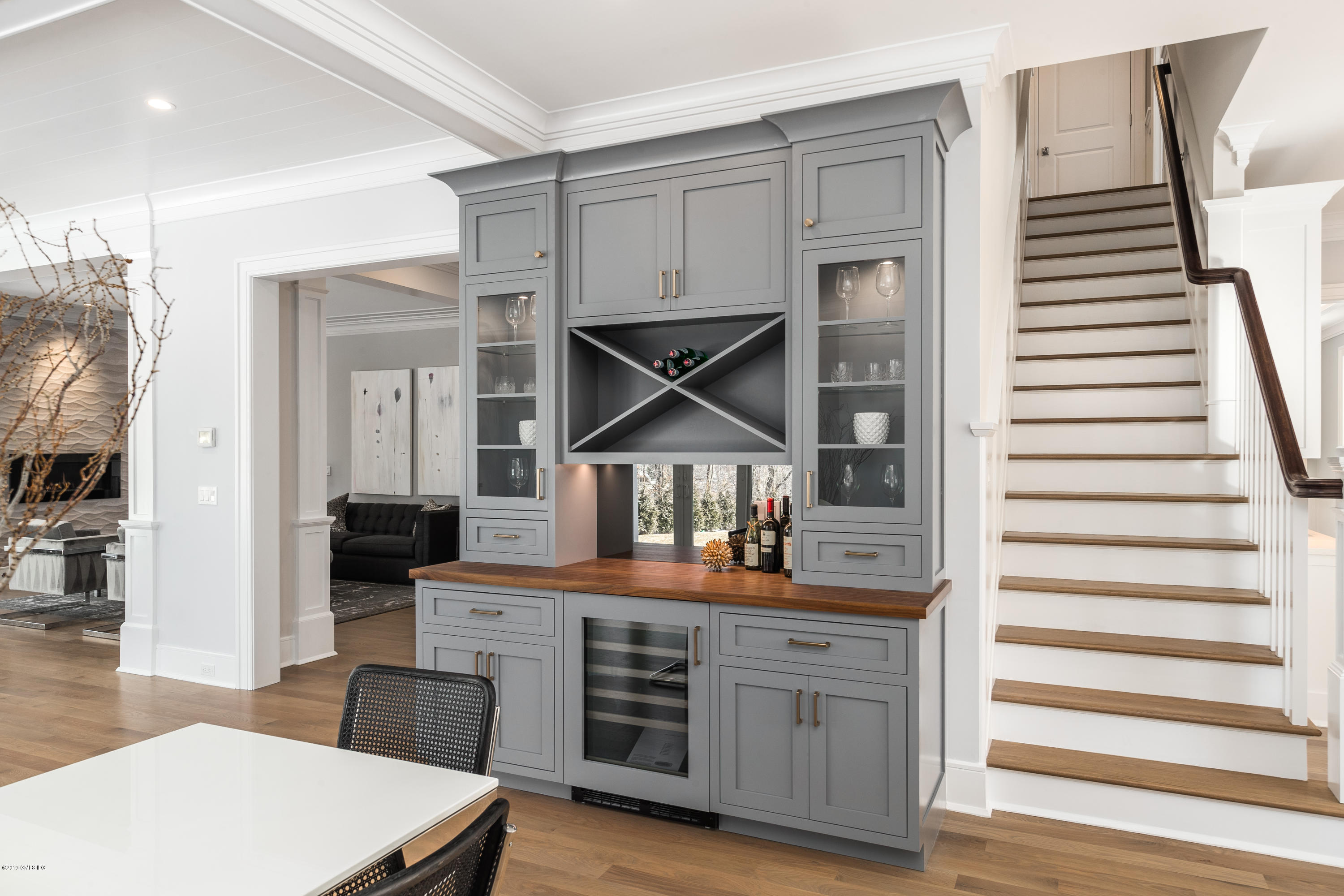 22 Mimosa Drive Cos Cob, CT 06807 - Photo 13 of 27 a kitchen with cabinets and wooden floor