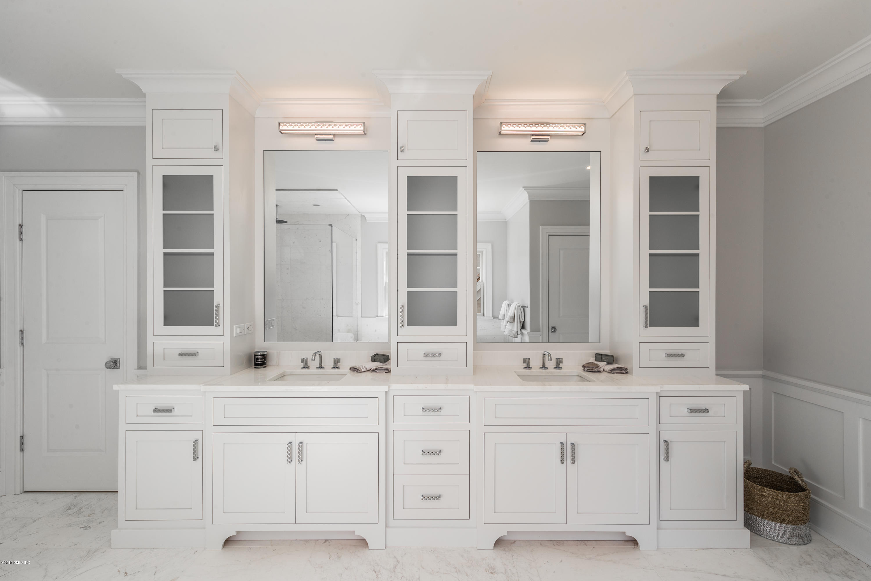 22 Mimosa Drive Cos Cob, CT 06807 - Photo 18 of 27 a bathroom with double vanity white cabinets and a mirror