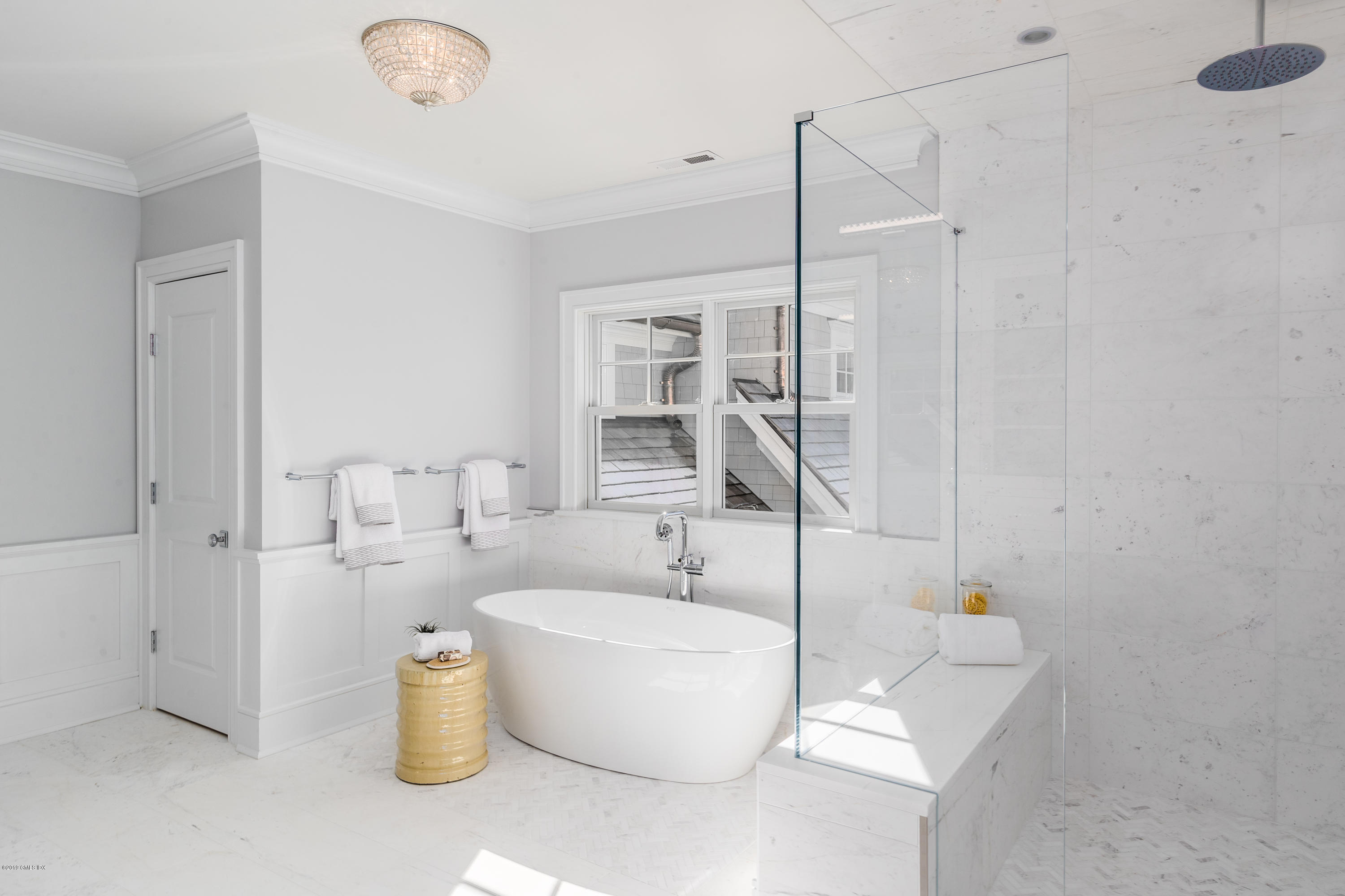 22 Mimosa Drive Cos Cob, CT 06807 - Photo 20 of 27 a white bath tub sitting next to a white sink