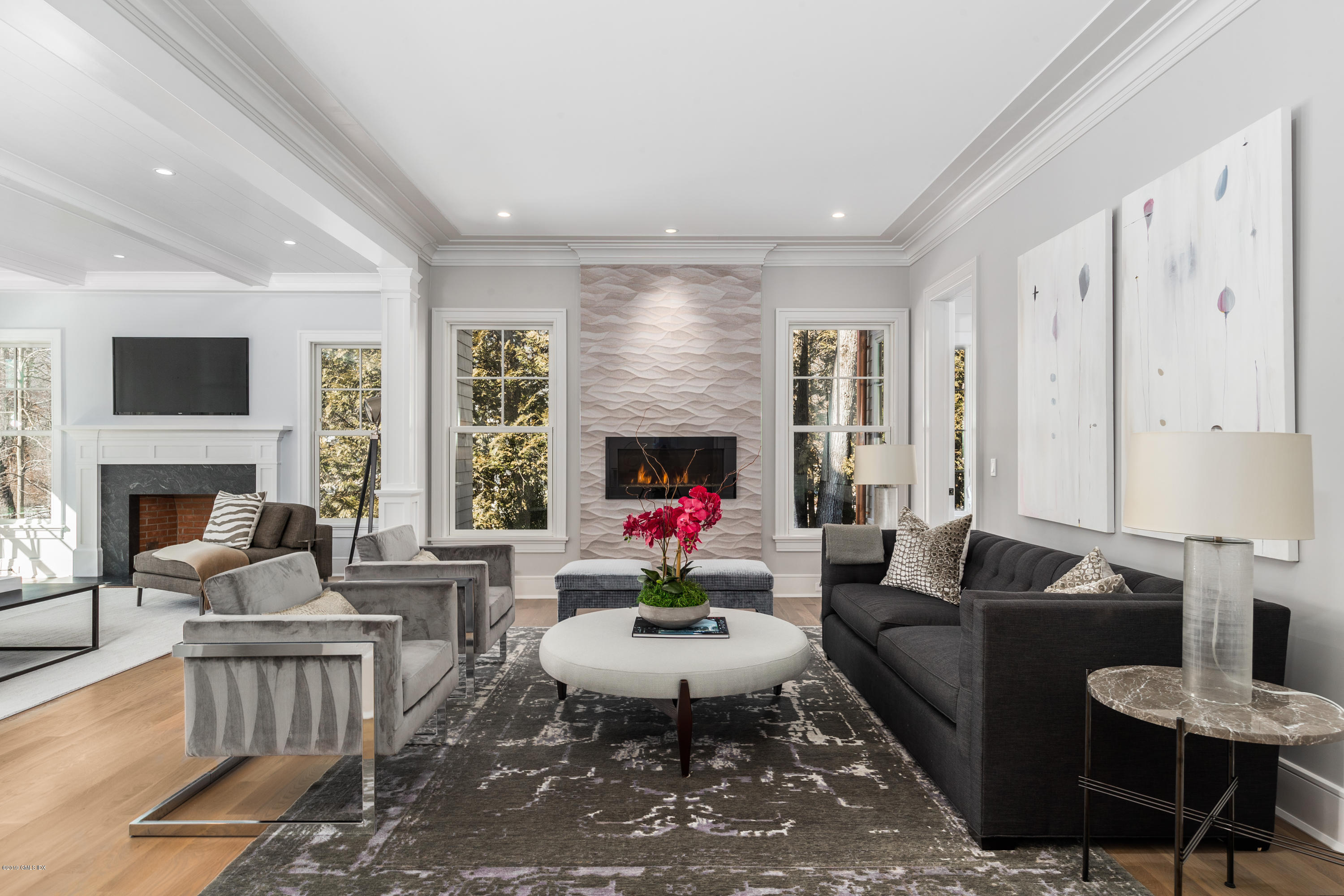 22 Mimosa Drive Cos Cob, CT 06807 - Photo 4 of 27 a living room with fireplace furniture and a fireplace