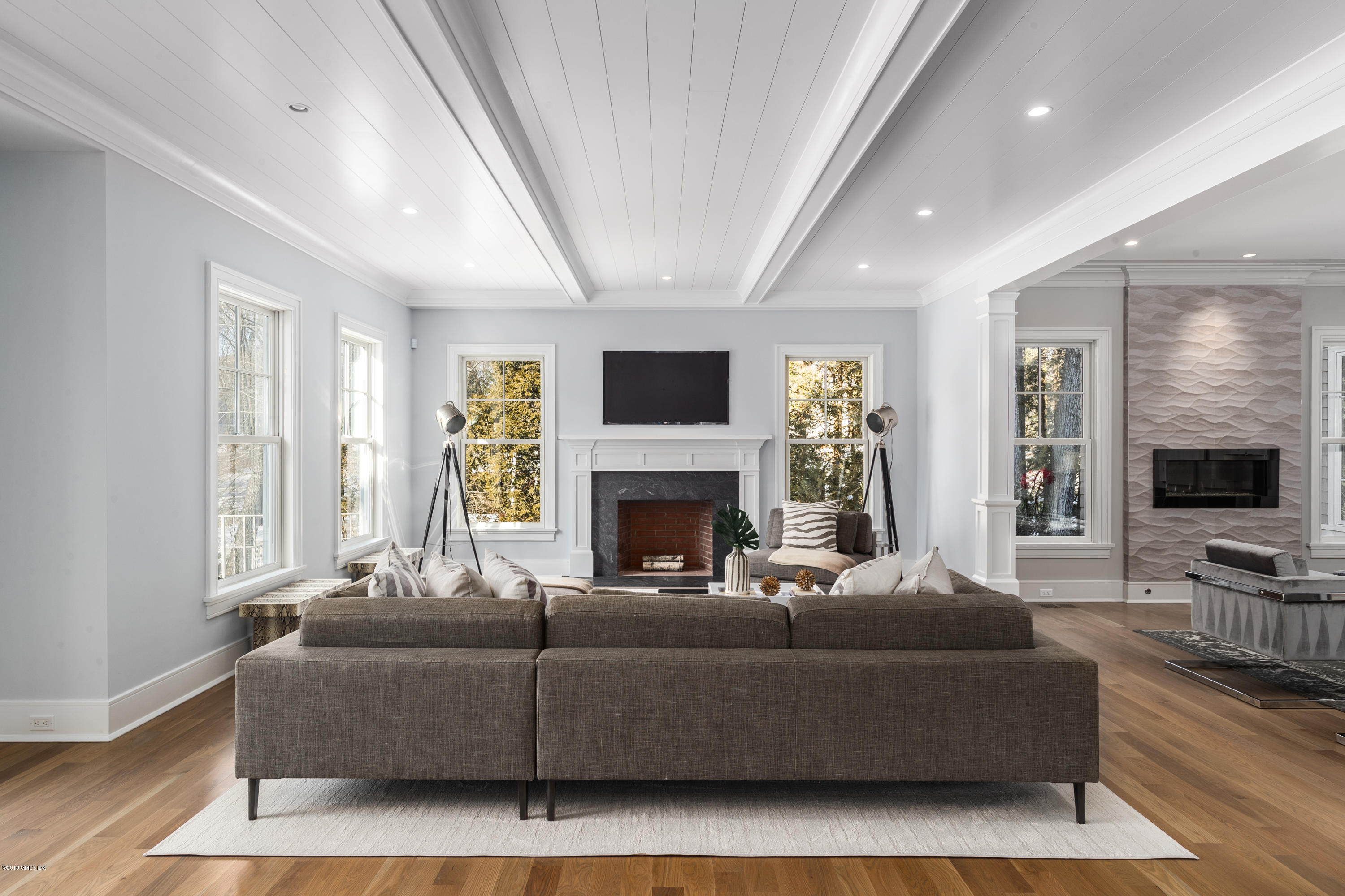 22 Mimosa Drive Cos Cob, CT 06807 - Photo 6 of 27 a living room with fireplace furniture and a flat screen tv