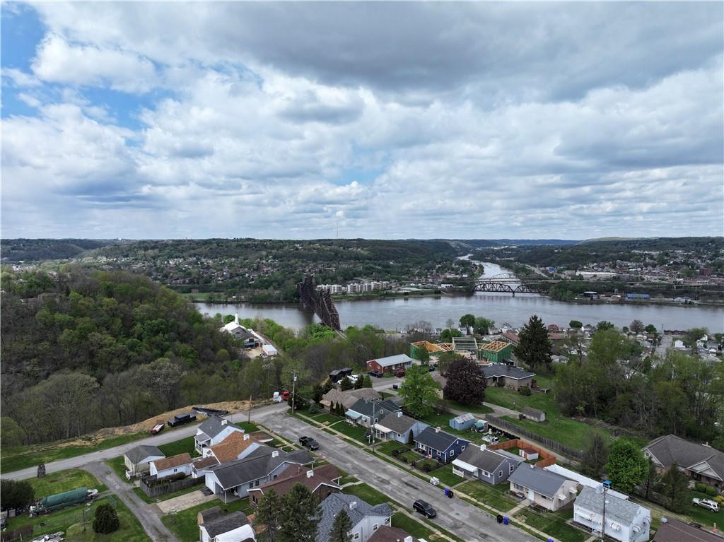 699 Kaye Avenue Monaca, PA 15061 - Photo 42 of 43 an aerial view of a city with lots of residential buildings ocean and mountain view in back
