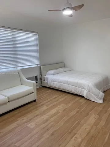 a living room with couches and a table