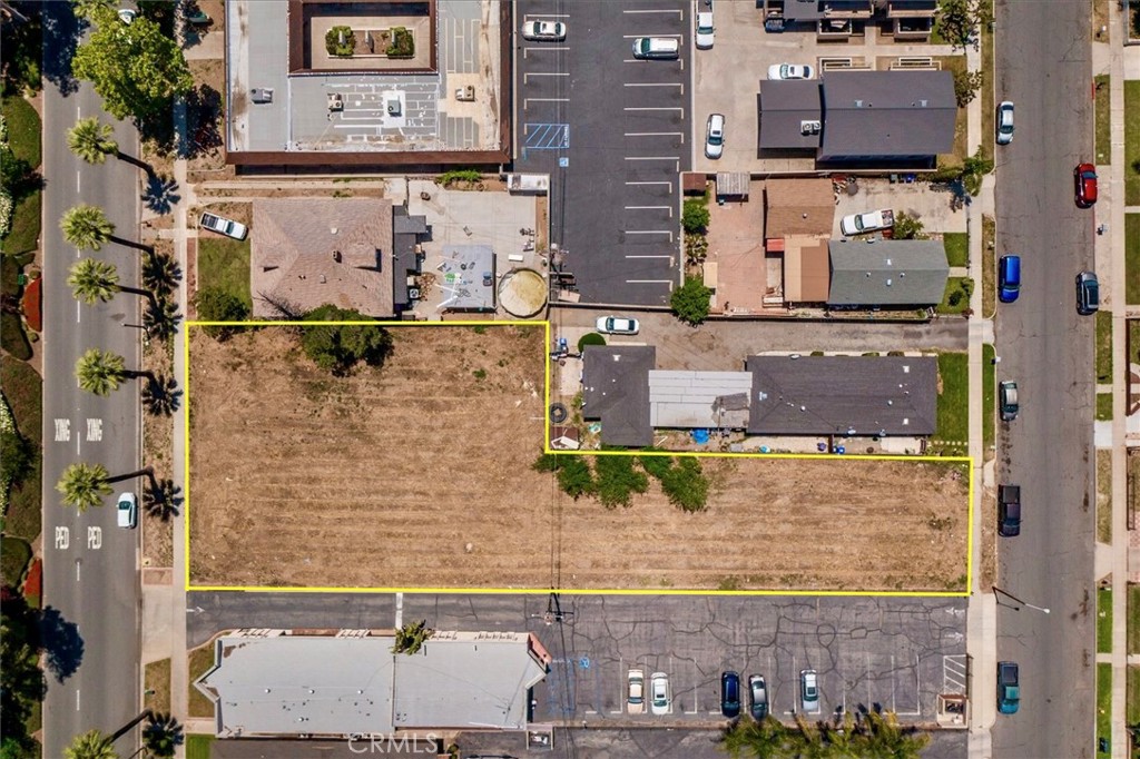 210 North Riverside Avenue Rialto, CA 92376 - Photo 6 of 7 an aerial view of residential houses with outdoor space