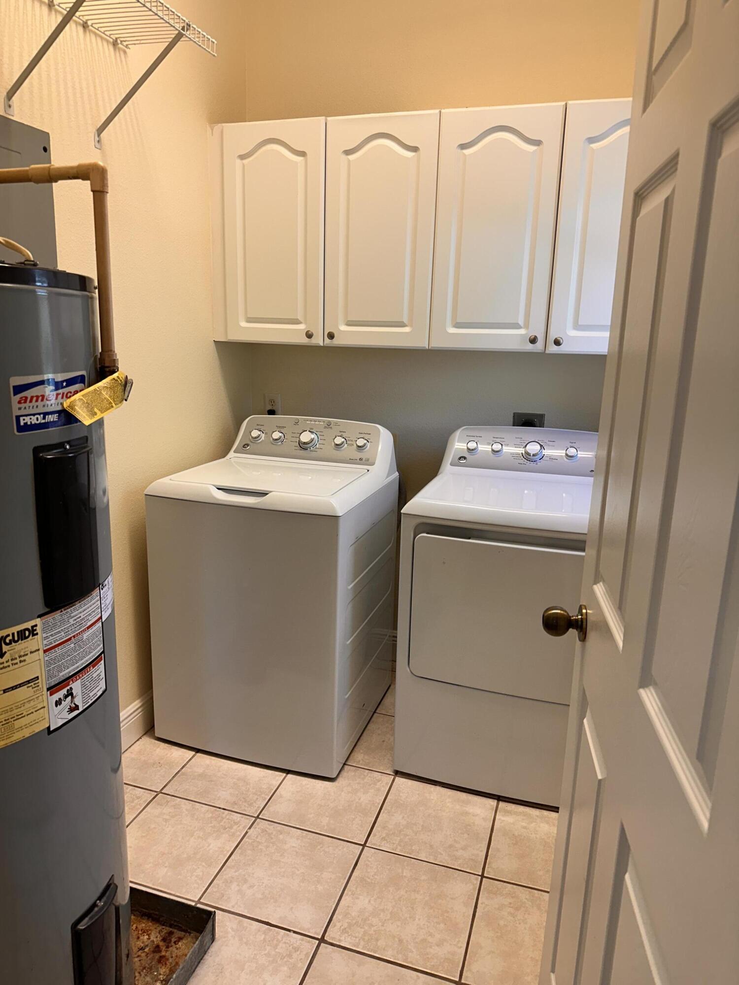 56 Spires Lane, Unit E16 Santa Rosa Beach, FL 32459 - Photo 14 of 17 a utility room with dryer and washer
