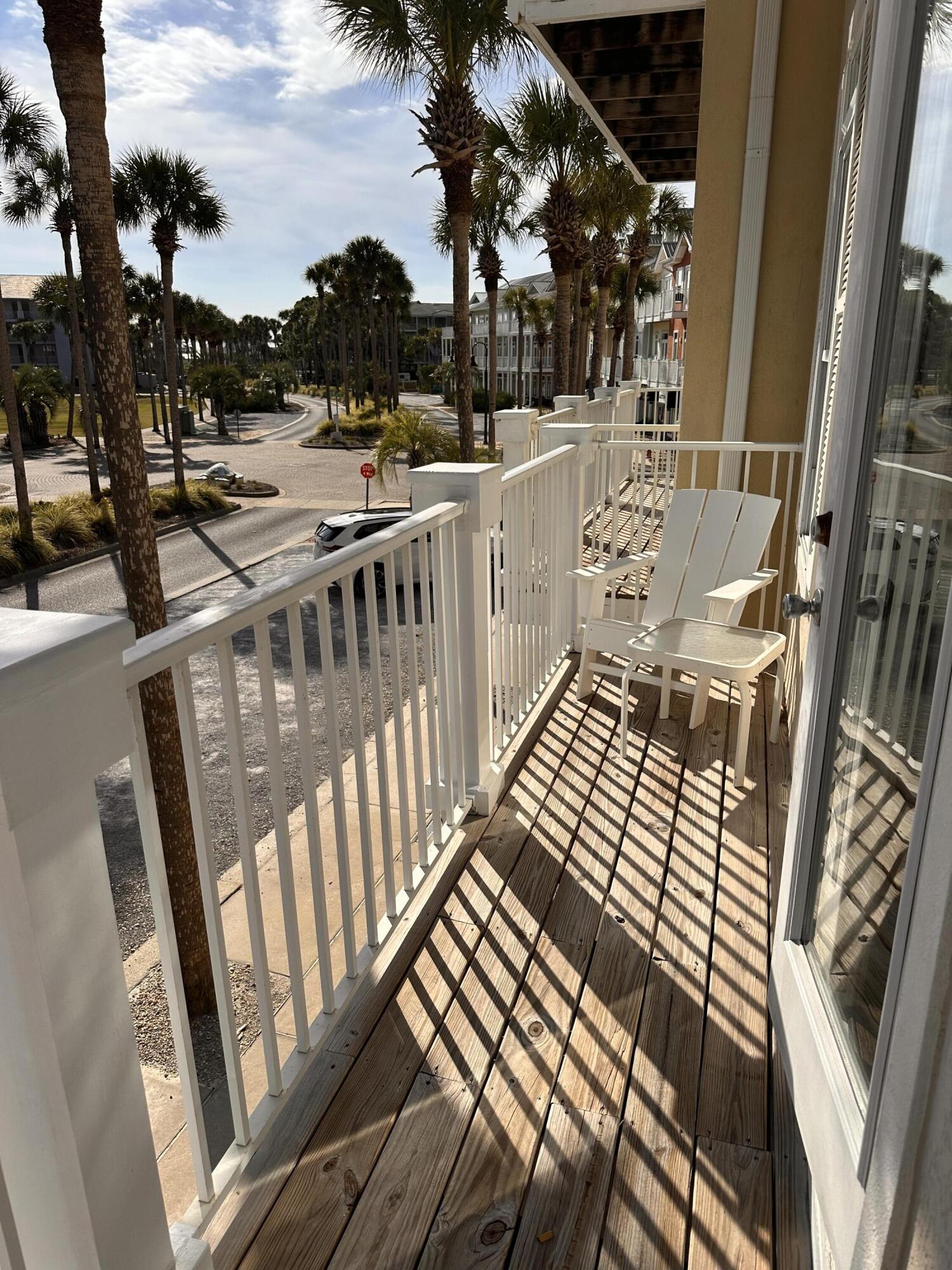 56 Spires Lane, Unit E16 Santa Rosa Beach, FL 32459 - Photo 15 of 17 a view of balcony with wooden floor