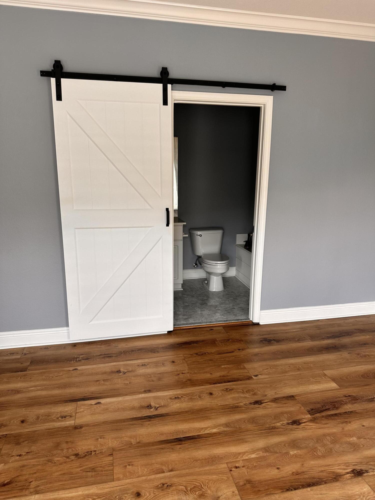 56 Spires Lane, Unit E16 Santa Rosa Beach, FL 32459 - Photo 5 of 17 a view of room with wooden floor