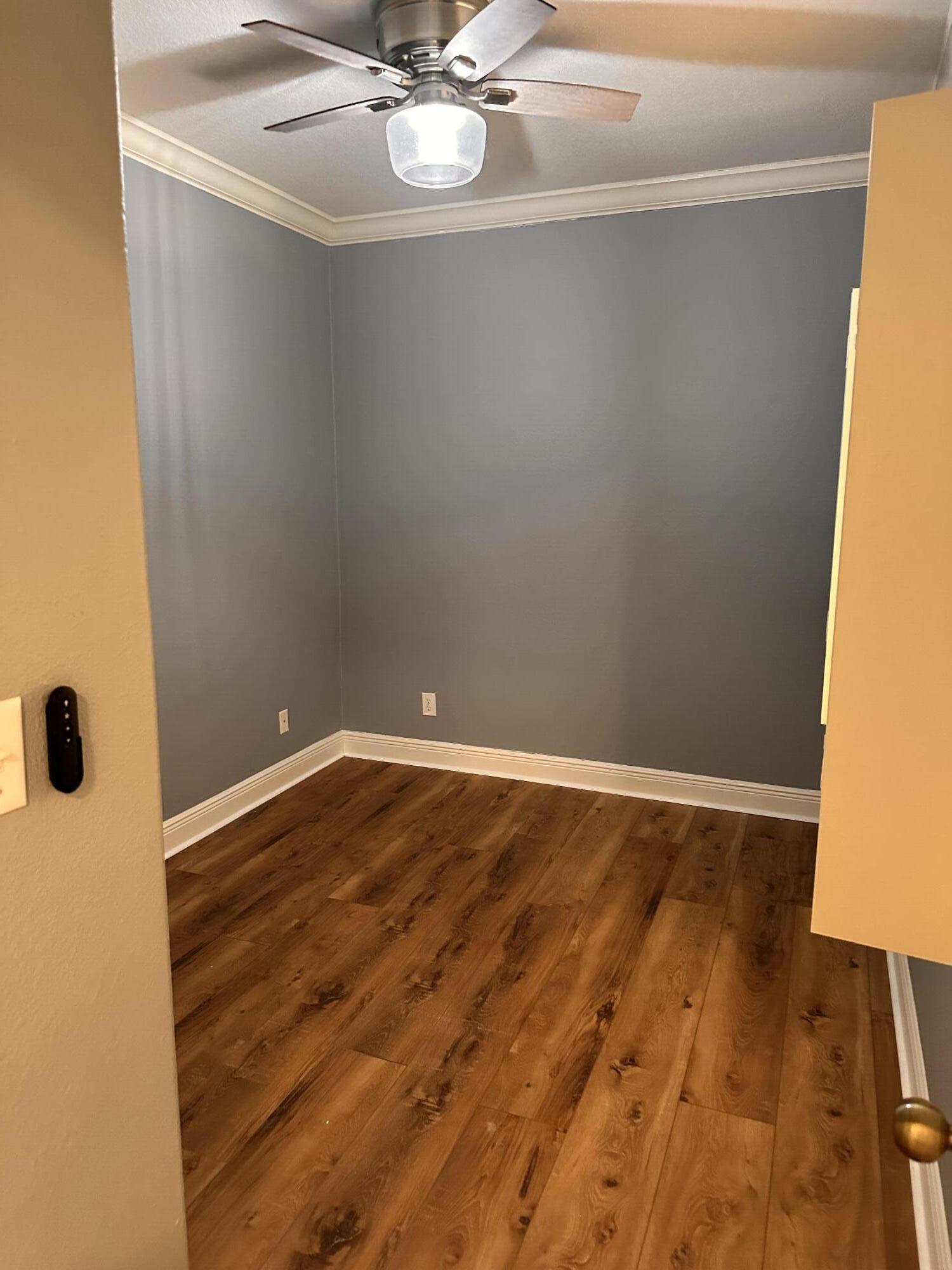 56 Spires Lane, Unit E16 Santa Rosa Beach, FL 32459 - Photo 8 of 17 a view of a room with wooden floor