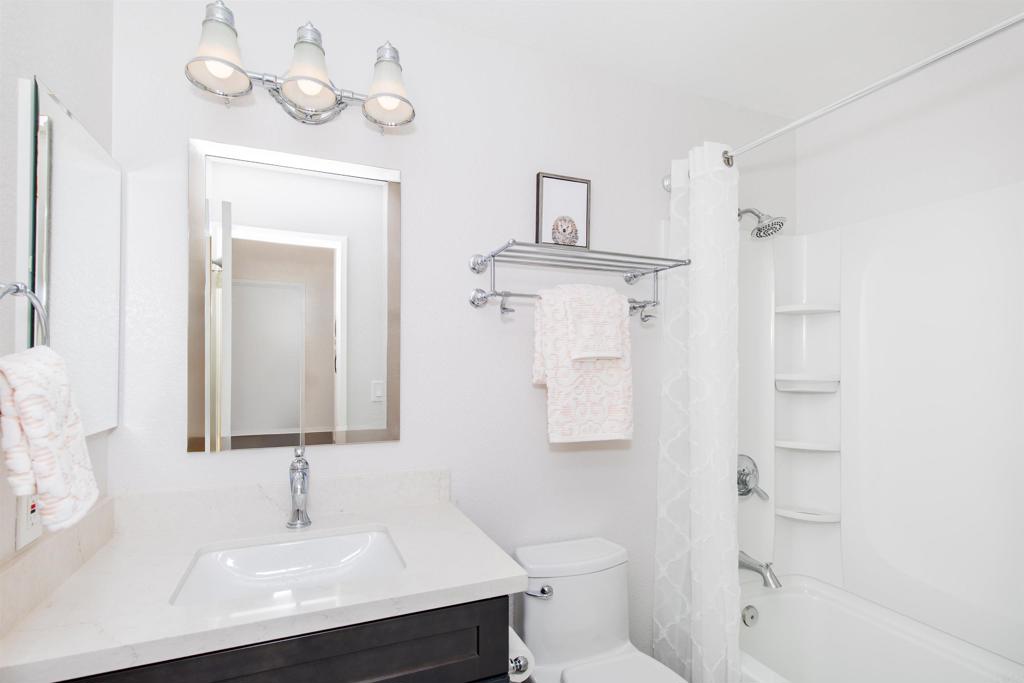 16327 Scarbery Road Ramona, CA 92065 - Photo 18 of 40 a bathroom with a sink a toilet and shower