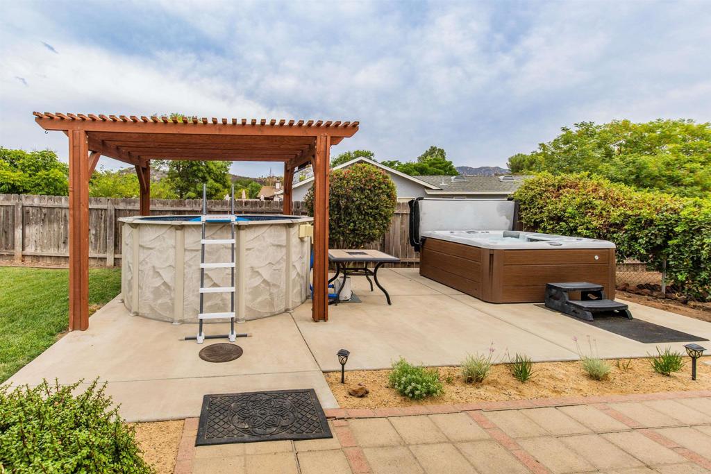 16327 Scarbery Road Ramona, CA 92065 - Photo 20 of 40 a view of a terrace with sitting area