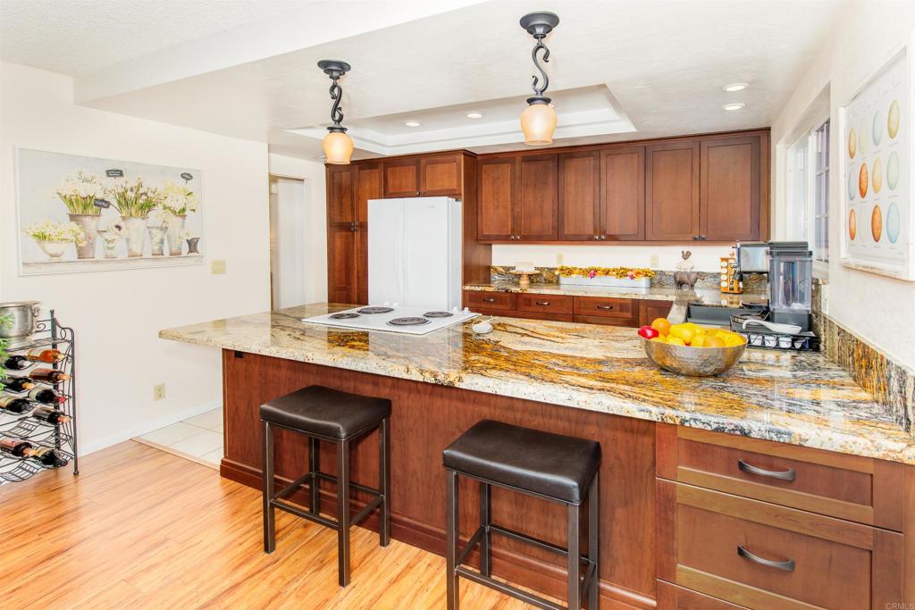 16327 Scarbery Road Ramona, CA 92065 - Photo 2 of 40 a kitchen with a sink cabinets and window