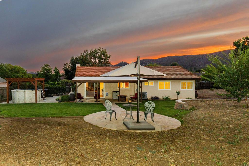 16327 Scarbery Road Ramona, CA 92065 - Photo 24 of 40 a front view of a house with garden