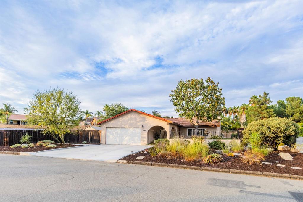 16327 Scarbery Road Ramona, CA 92065 - Photo 26 of 40 front view of a house with a pathway