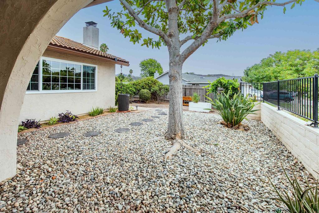 16327 Scarbery Road Ramona, CA 92065 - Photo 28 of 40 a front view of a house with a yard