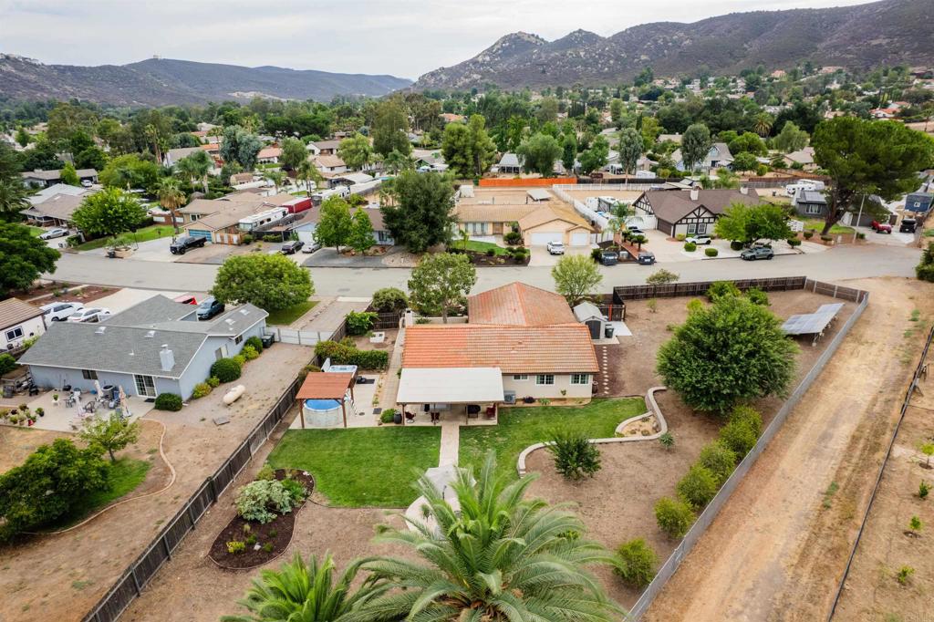 16327 Scarbery Road Ramona, CA 92065 - Photo 31 of 40 an aerial view of a house with a garden