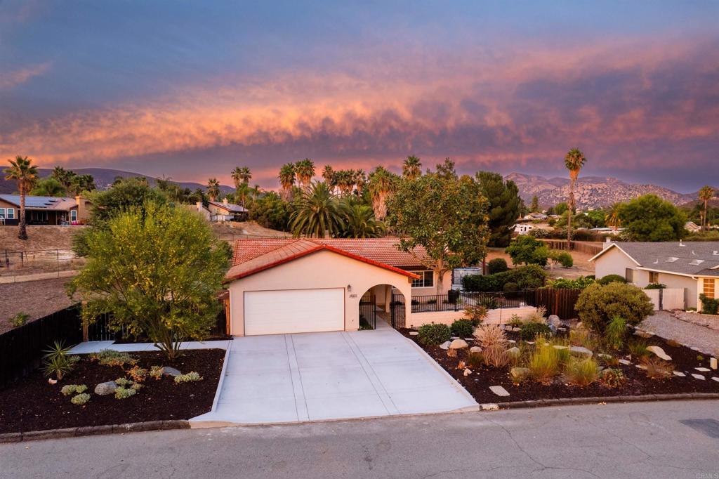16327 Scarbery Road Ramona, CA 92065 - Photo 38 of 40 a view of a house with a yard