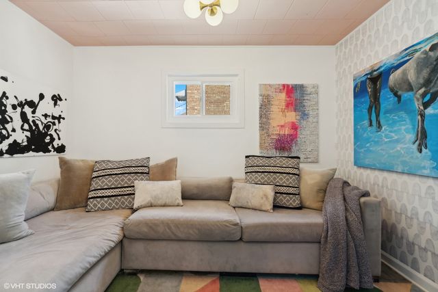 a living room with furniture and a couch