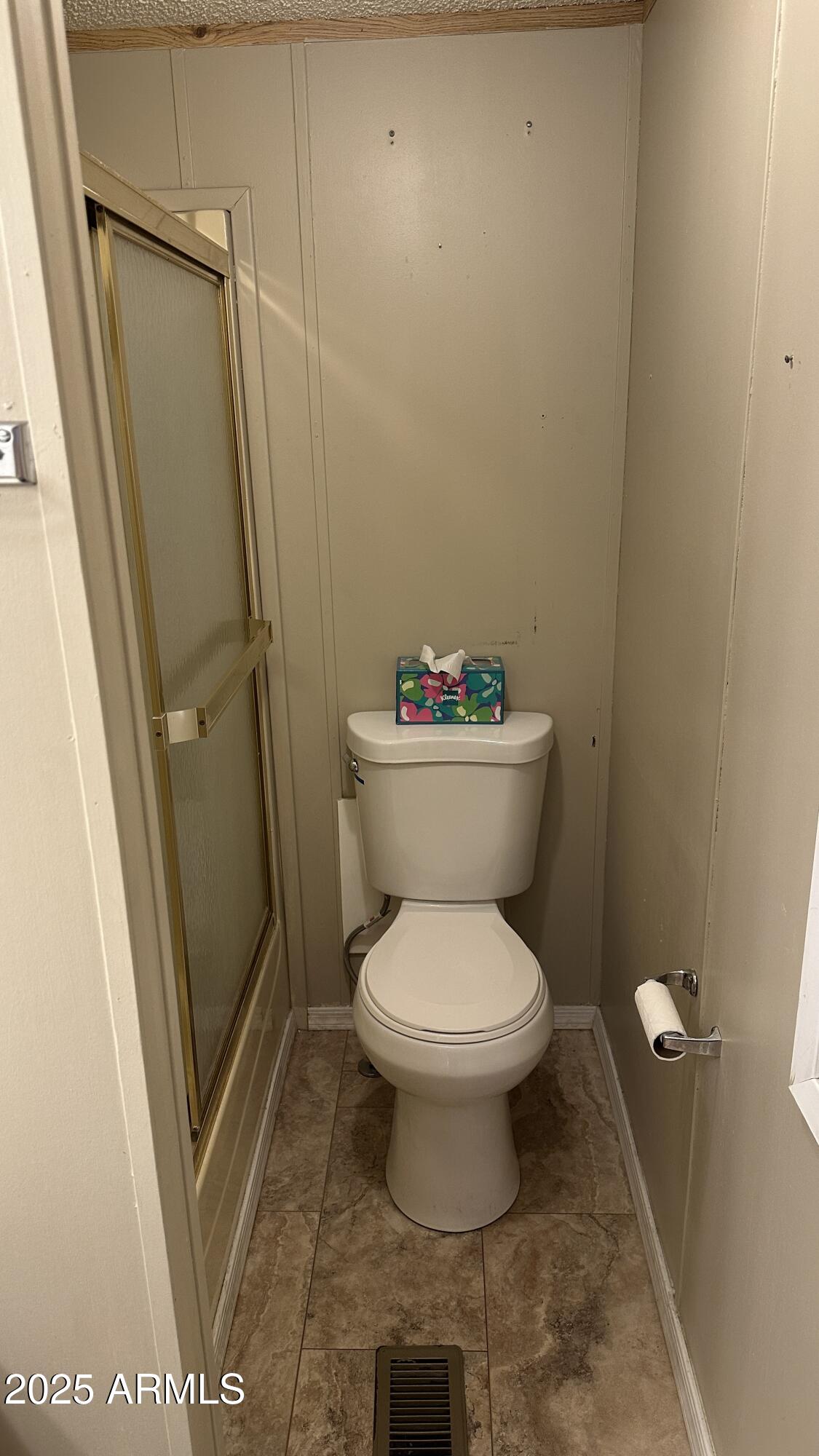 834 South Meridian Road, Unit 105 Apache Junction, AZ 85120 - Photo 21 of 48 a bathroom with a toilet and a sink