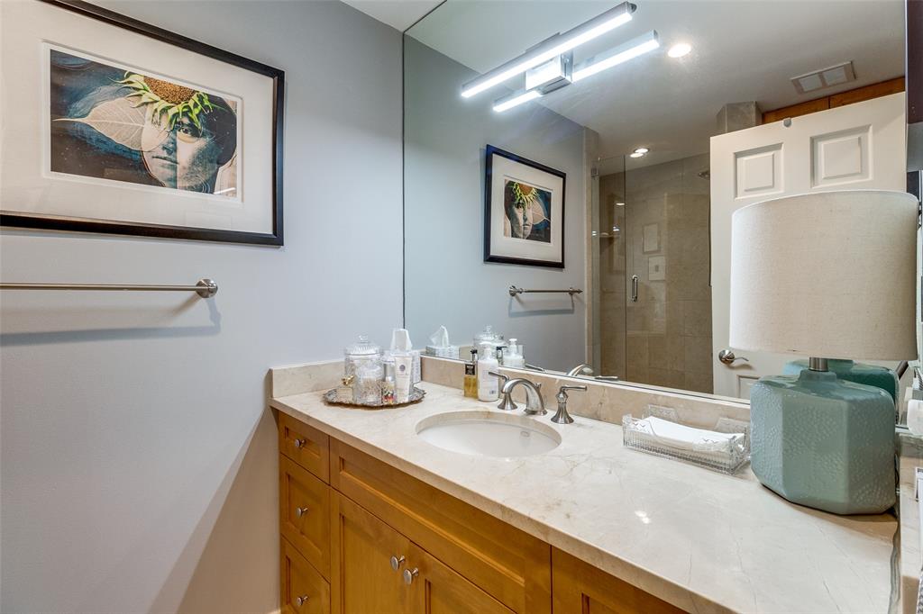 5909 Luther Lane, Unit 2104 Dallas, TX 75225 - Photo 17 of 21 Full bath featuring vanity and a shower stall