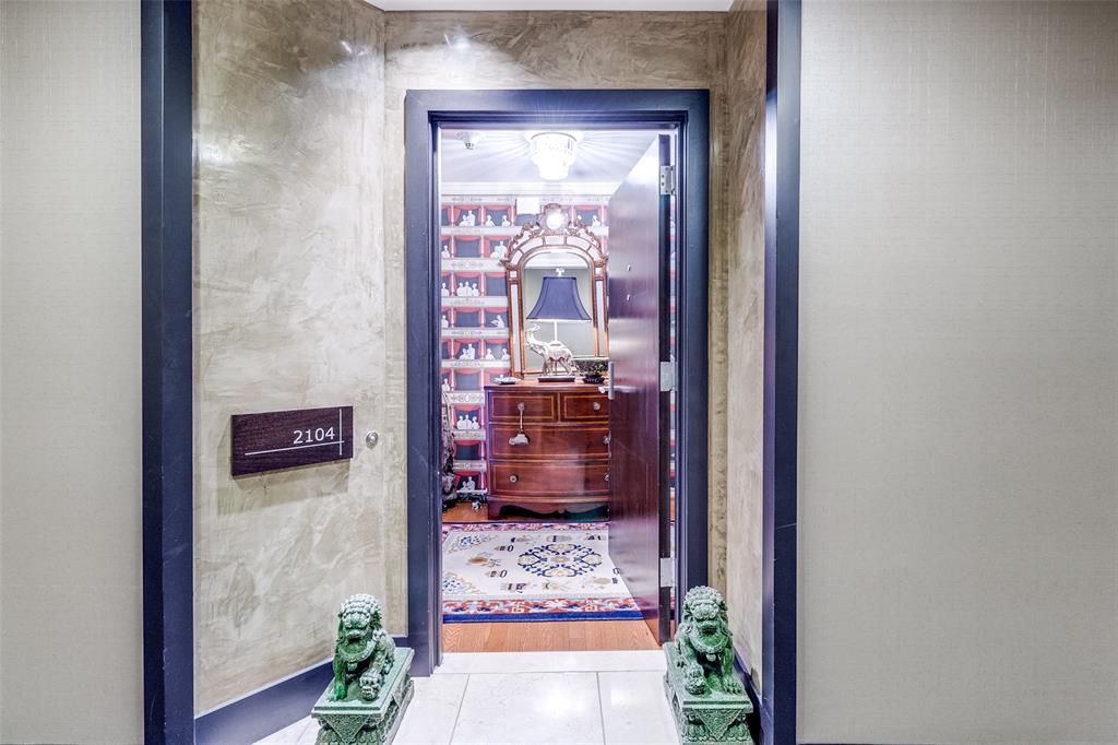 5909 Luther Lane, Unit 2104 Dallas, TX 75225 - Photo 2 of 22 a view of a wooden door