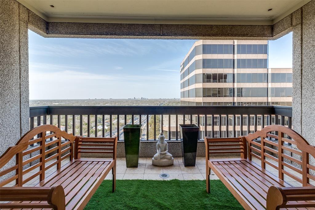 5909 Luther Lane, Unit 2104 Dallas, TX 75225 - Photo 21 of 22 a view of balcony with wooden floor