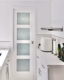 a bathroom with a sink and mirror