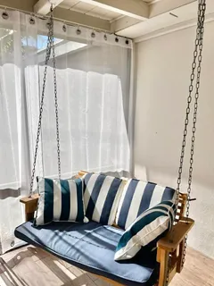 a view of a living room with furniture