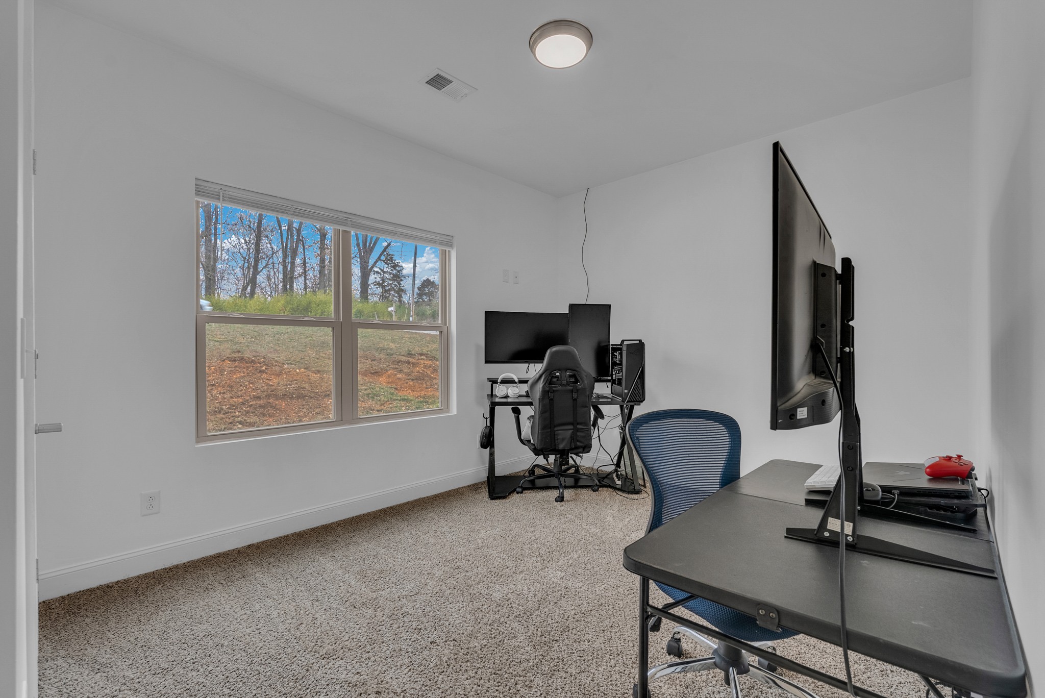 415 Old Morrison Road McMinnville, TN 37110 - Photo 11 of 20 a view of a workspace with furniture and a window