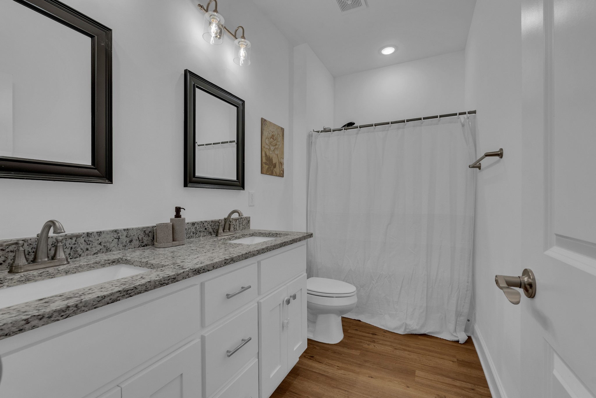 415 Old Morrison Road McMinnville, TN 37110 - Photo 13 of 20 a bathroom with a granite countertop sink toilet and shower