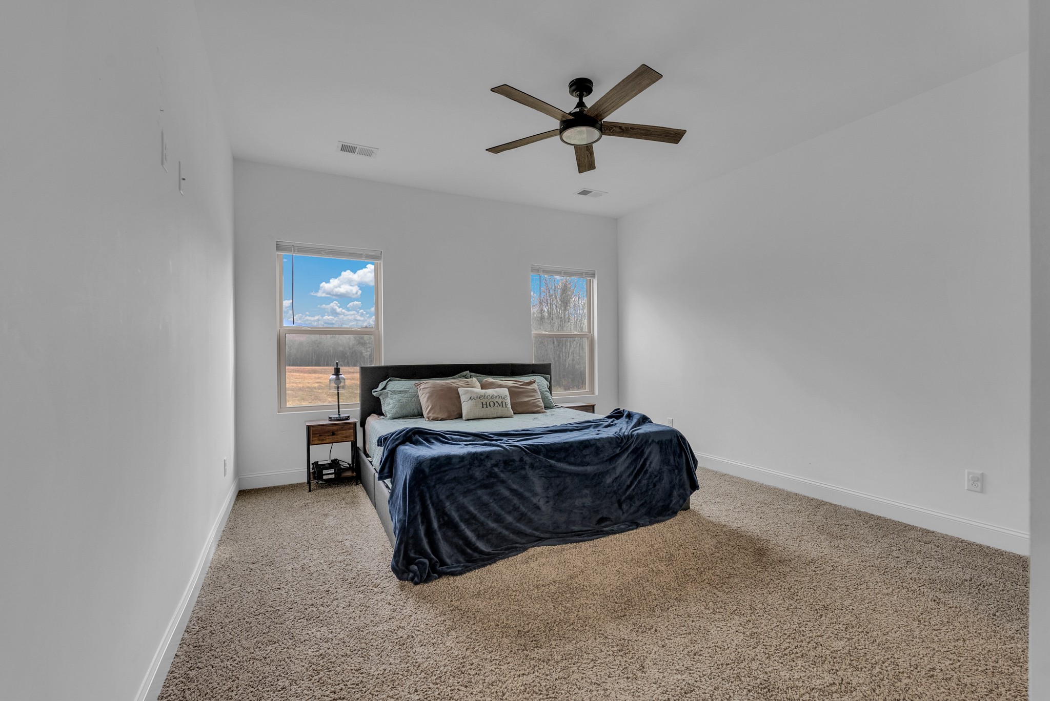 415 Old Morrison Road McMinnville, TN 37110 - Photo 9 of 20 a bedroom with a bed and a ceiling fan