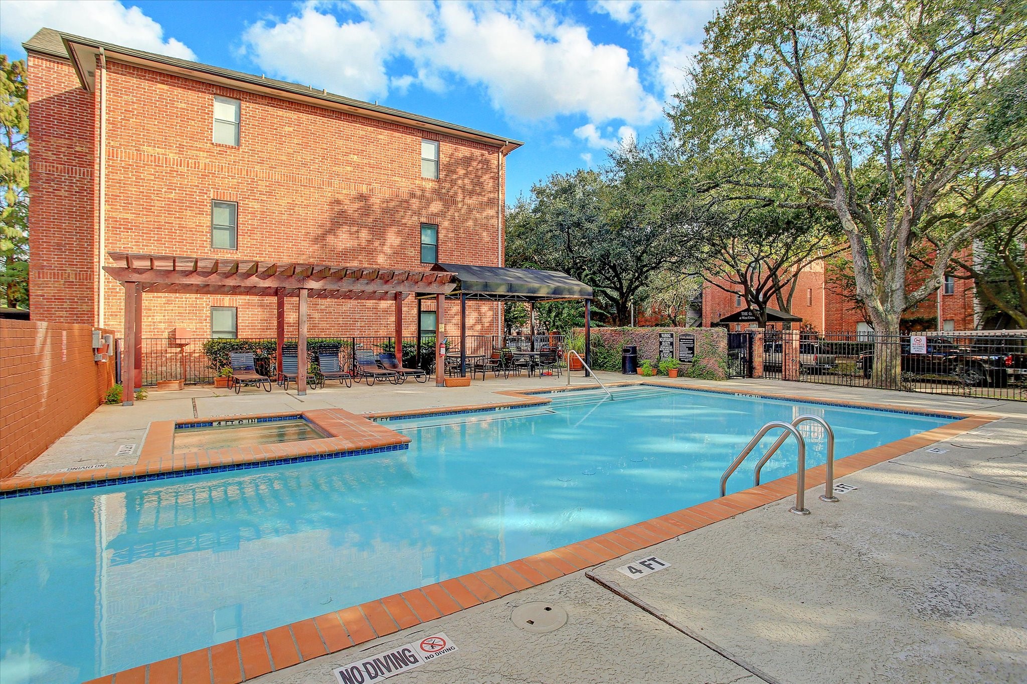 4041 Law Street, Unit 512 Houston, TX 77005 - Photo 13 of 15 Sparkling pool just steps away from unit 512.