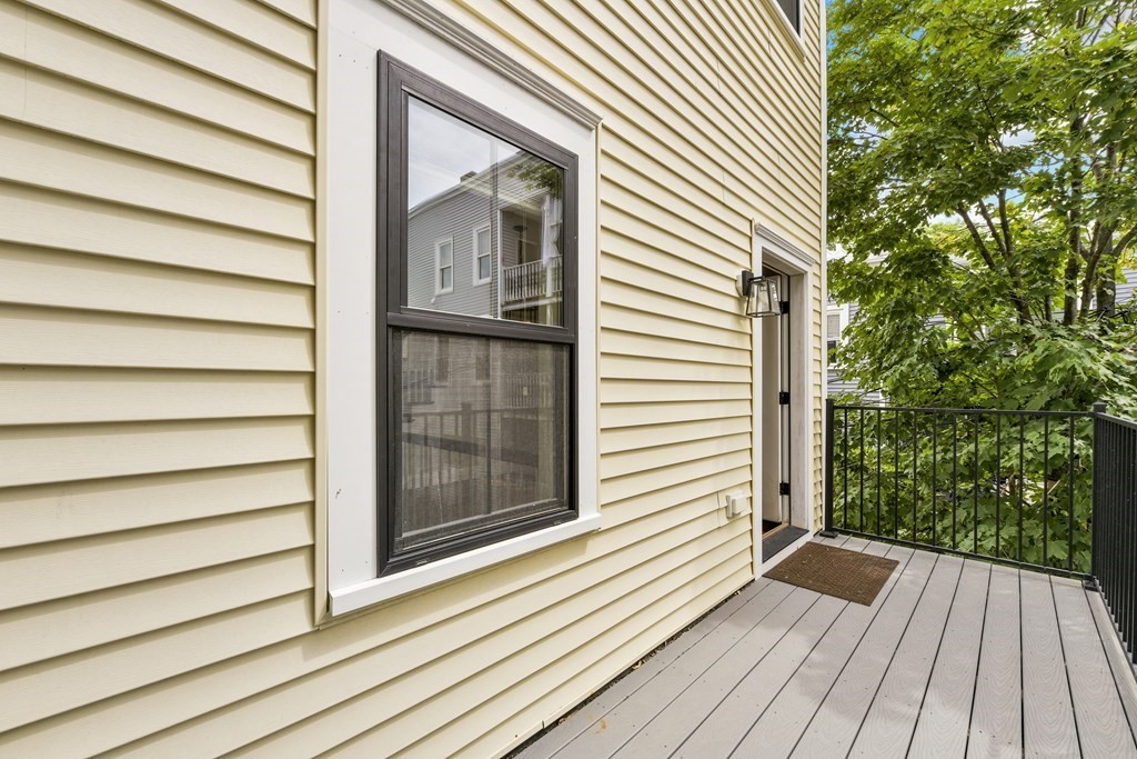 1514 R Columbia Road, Unit 2 Boston, MA 02127 - Photo 5 of 28 a view of a house with a porch