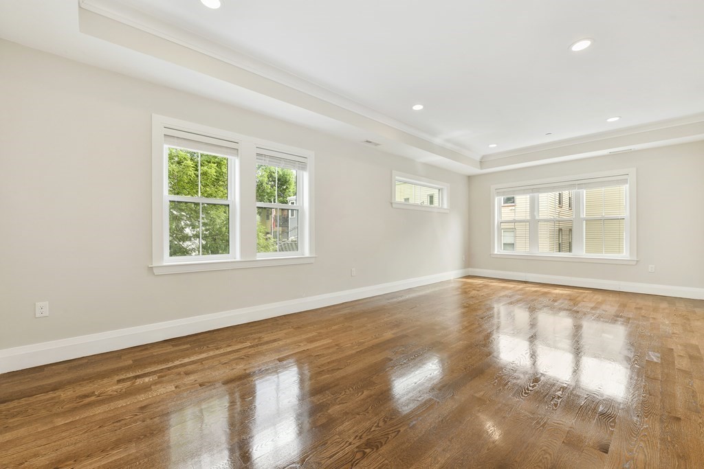 1514 R Columbia Road, Unit 2 Boston, MA 02127 - Photo 9 of 28 a view of an empty room with a window
