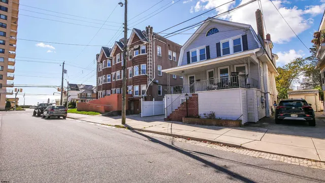 a view of a street with cars