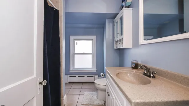 a bathroom with a sink and a bathtub