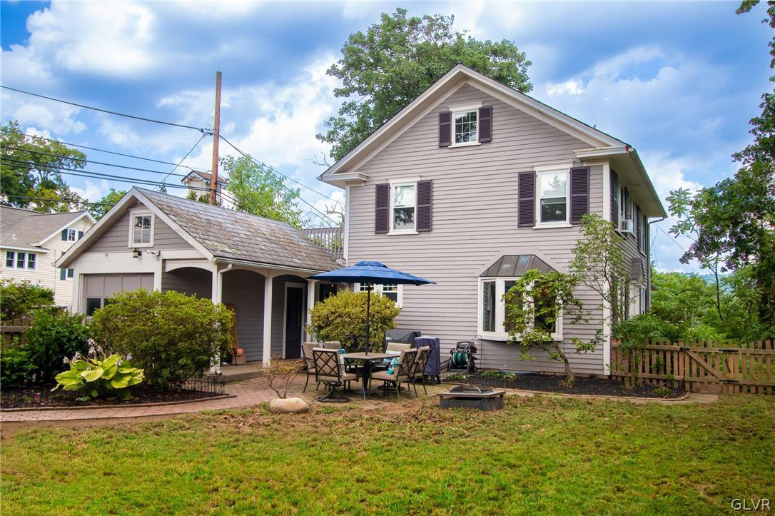 817 Easton Road Riegelsville, PA 18077 - Photo 1 of 43 a front view of a house with patio