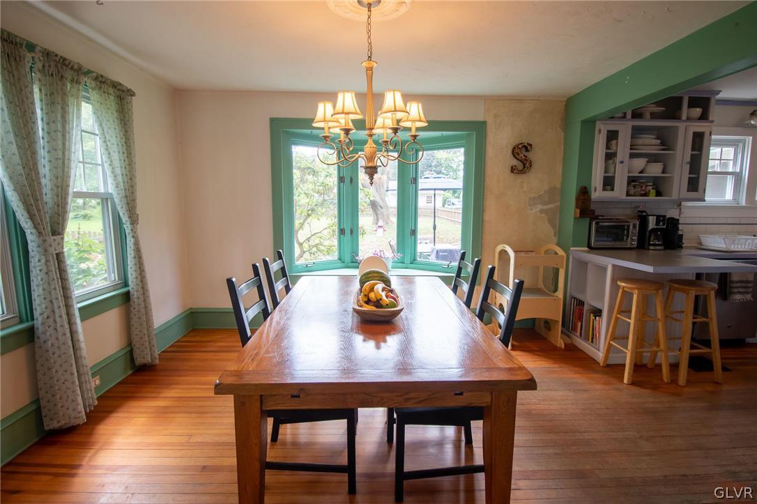 817 Easton Road Riegelsville, PA 18077 - Photo 13 of 43 a view of a dining room with furniture window and wooden floor