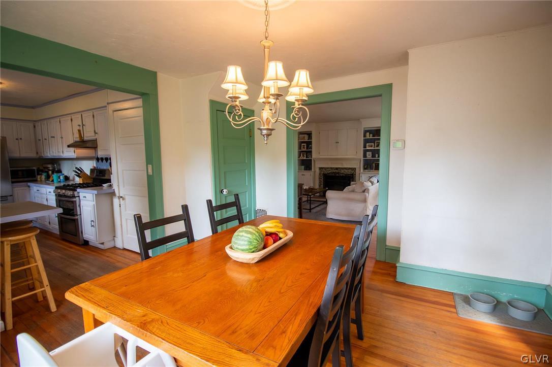817 Easton Road Riegelsville, PA 18077 - Photo 16 of 43 a view of a dining room with furniture and a chandelier