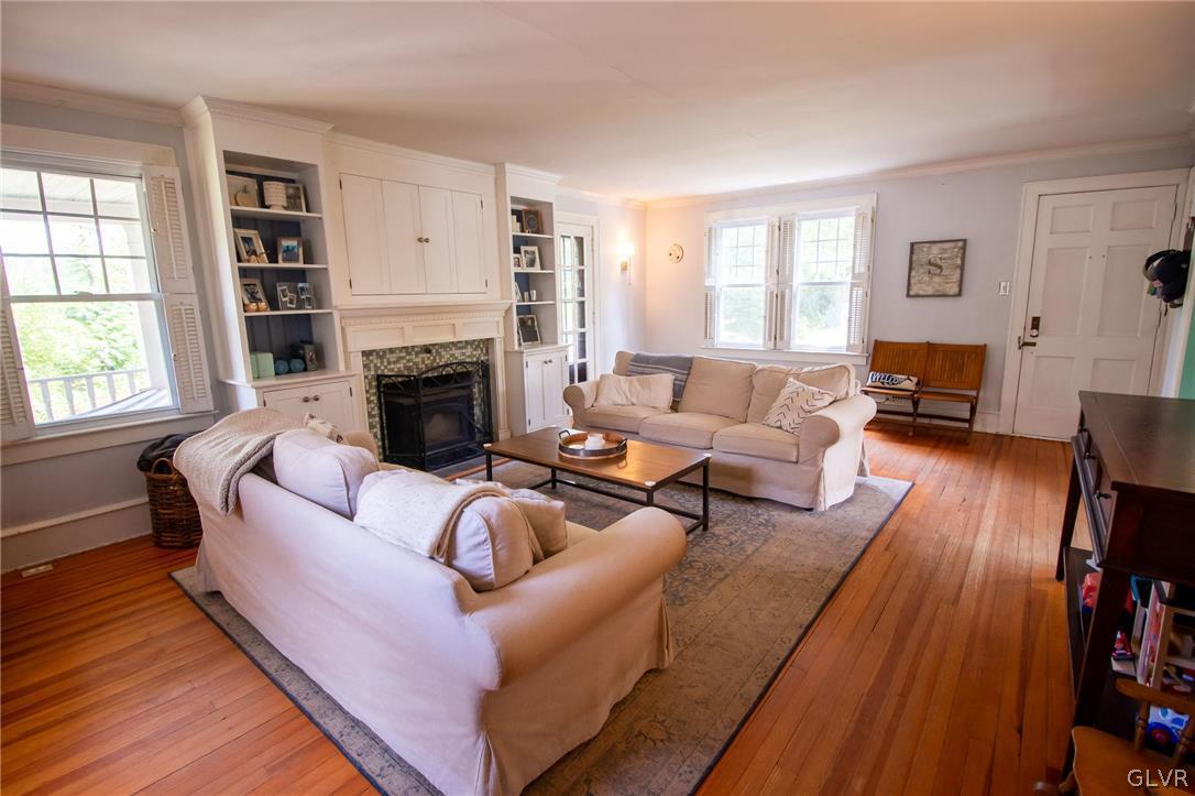 817 Easton Road Riegelsville, PA 18077 - Photo 18 of 43 a living room with furniture and a fireplace