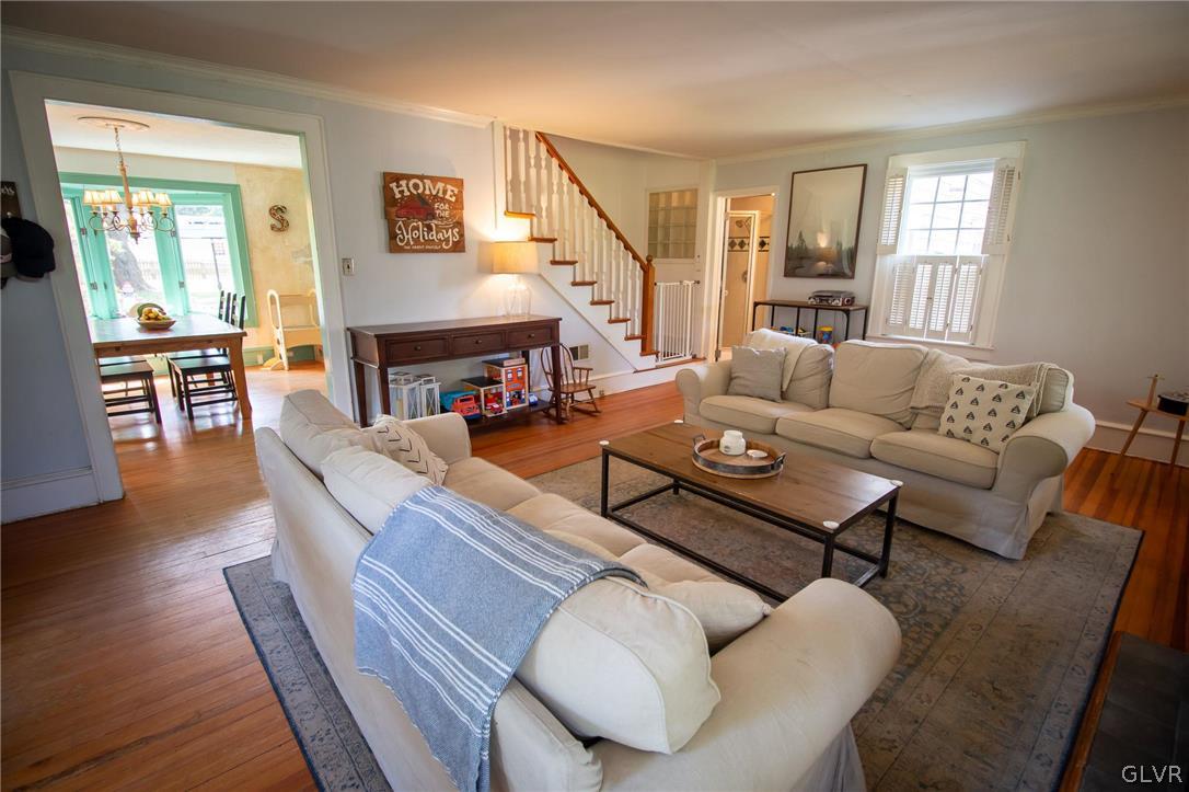 817 Easton Road Riegelsville, PA 18077 - Photo 20 of 43 a living room with furniture fireplace and wooden floor