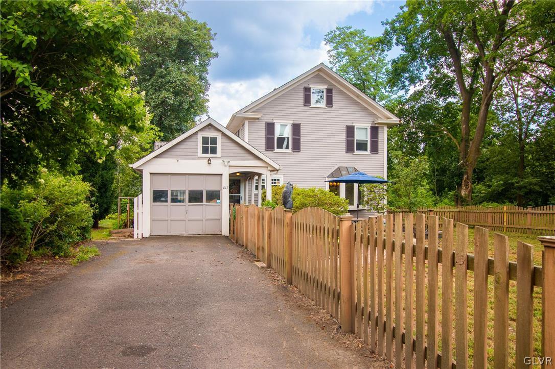 817 Easton Road Riegelsville, PA 18077 - Photo 2 of 43 a front view of a house with wooden fence