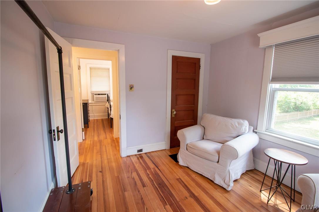 817 Easton Road Riegelsville, PA 18077 - Photo 25 of 43 a spacious bedroom with a bed and a couch