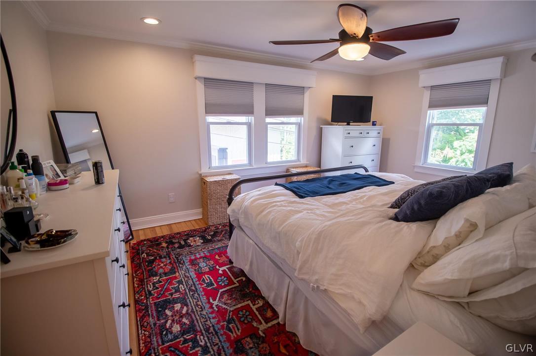 817 Easton Road Riegelsville, PA 18077 - Photo 29 of 43 a bedroom with a bed and a flat tv screen on the dresser