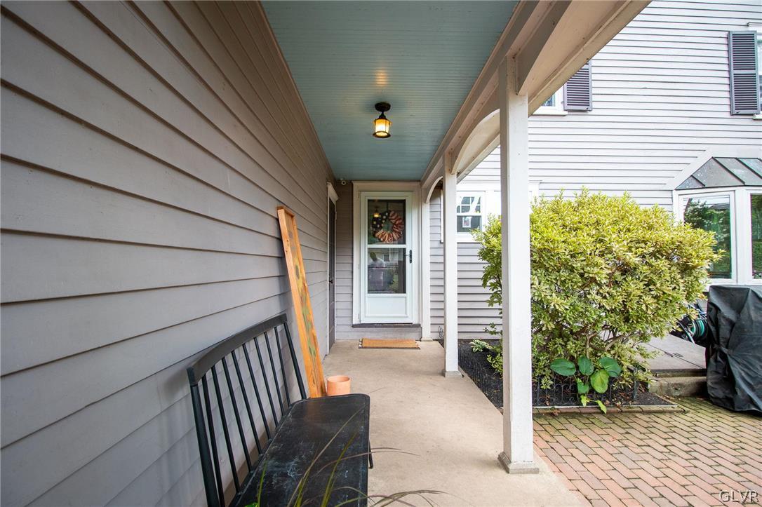 817 Easton Road Riegelsville, PA 18077 - Photo 4 of 43 a view of a porch with furniture and garden
