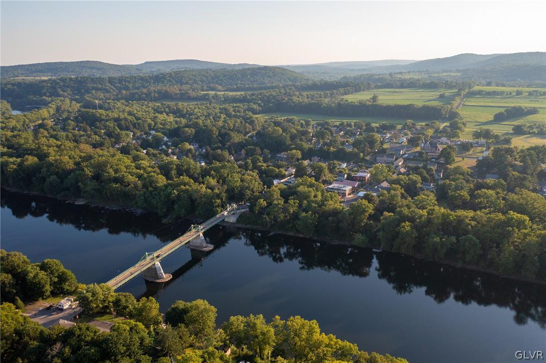 817 Easton Road Riegelsville, PA 18077 - Photo 41 of 43 a view of a lake with a mountain