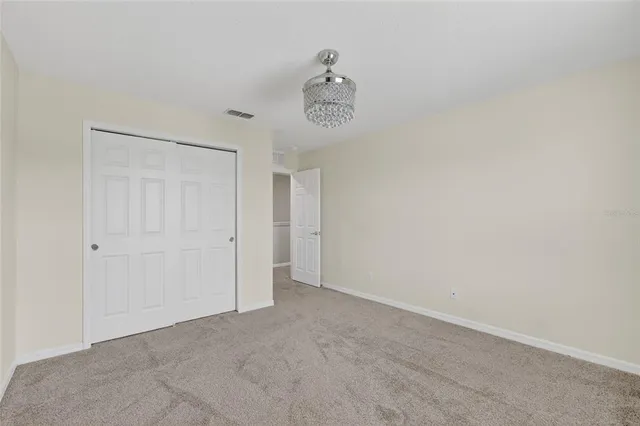 a view of a room with an empty space