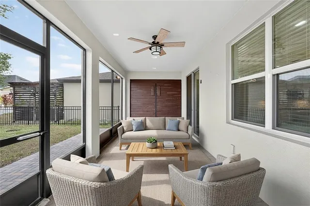 a living room with furniture and a window