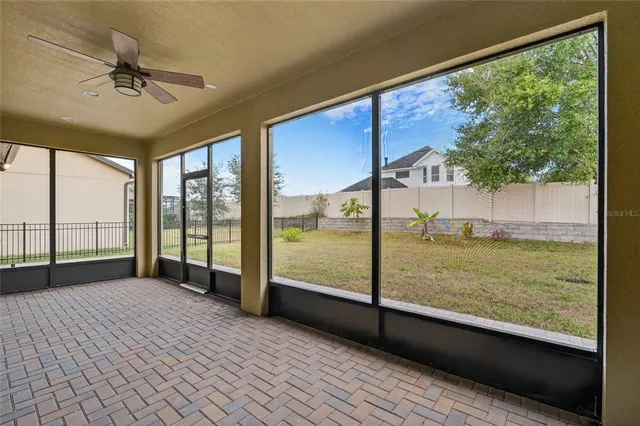 a view of a room with a large window